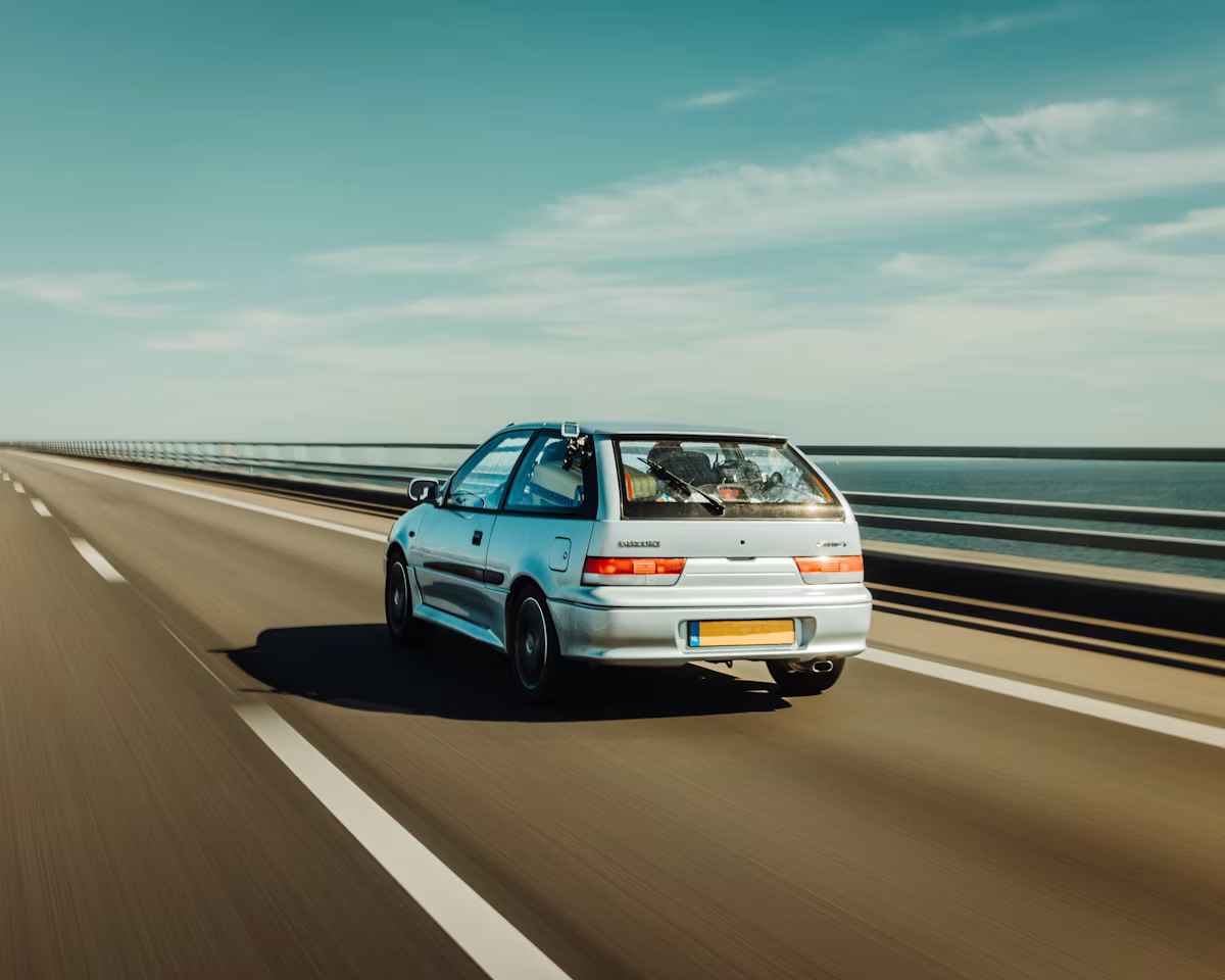 Car driving on a long highway cross-country